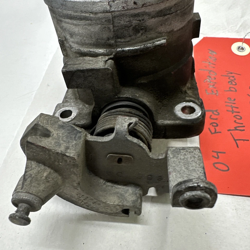 2004 FORD EXPEDITION THROTTLE BODY. PART NUMBER YL3U-AB  PRE-OWNED - Image 4 of 4