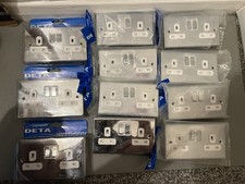 3 X Deta ultra flatplate 2-Gang Switched Sockets and 8 X Deta Slimline Decor