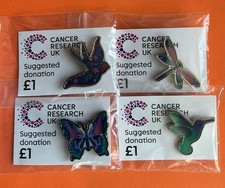 UK CANCER RELIEF BADGES -NEW Set Of  x (4)  charity pin badges