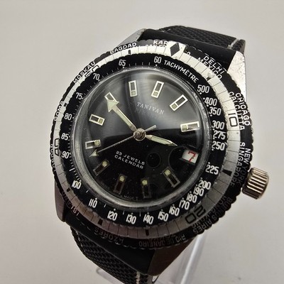 TANIVAN PIRANIA TRIPLE BEZEL HERREN TAUCHERUHR STAHL SCHWEIZER HANDAUFZUG WELTZEIT.