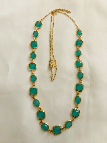 KATE SPADE NEW YORK GREEN AND GOLD 