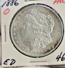 1886 O US Morgan Silver Dollar $1 AU (Cleaned)