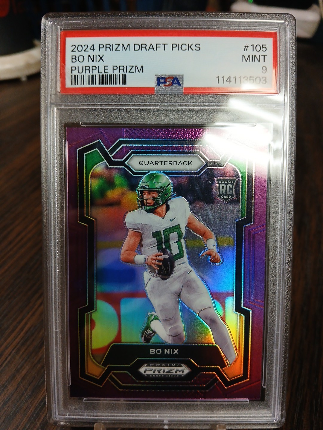 2024 Panini Prizm Draft Picks Bo Nix RC #105 Purple Prizm SP 16/75 PSA 9 Mint