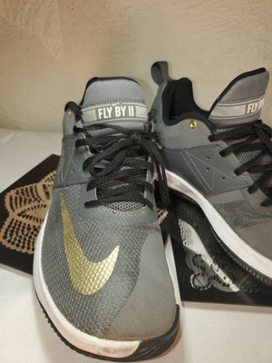 nike flyby low black and gold