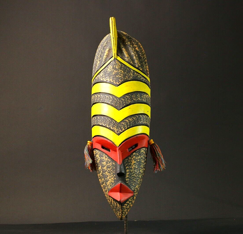 Afrikanische Maske Vintage Guro gelbes Wappen mit Quasten Stammeswandaufstell...