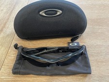 Used Oakley Flak Jacket 12-900 Jet Black Frame Black Iridium Polarized Lenses