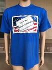 Blue EUC vintage 1995 T-shirt with white POW MIA Never Forgotten stamp and red, white, and blue USA flag design.