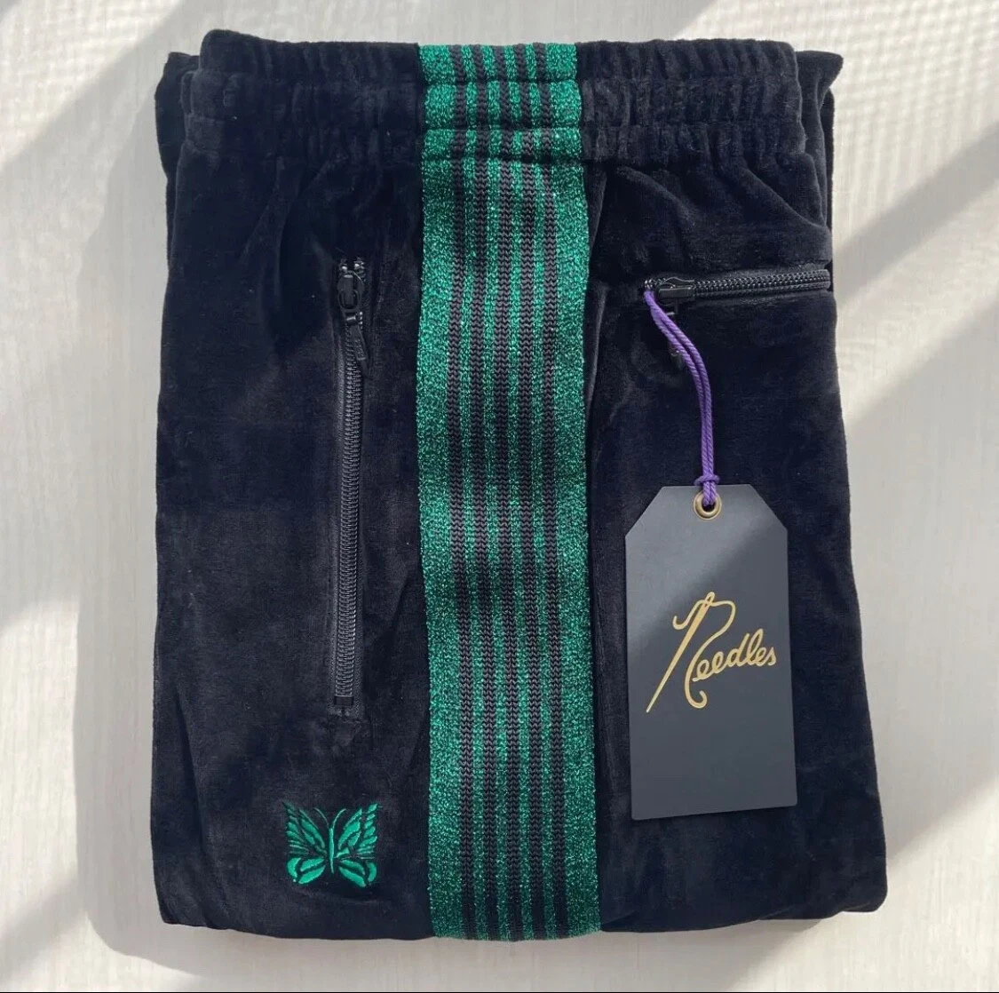 Black and hot sale green track pants