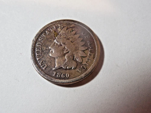 1860 CN Pointed Bust Indian Head Penny in good condition. Nice rim and coin.