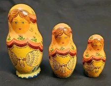 Vintage Hand Painted Russian Nesting Dolls Signed Lovely Lady W/Flowers Set of 3