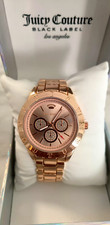 Ladies Juicy Couture analog wrist watch, rose gold metal..brand NEW.+Battery