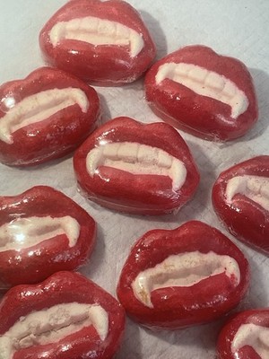 It Unfolds with Violets & Lilies and Has Cherry Orange & Pineapple Bath Bombs