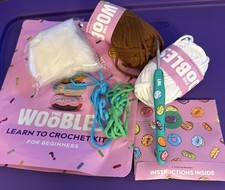 The Woobles Crochet Mystery Donut Log With Special Hook Brown White Green Blue