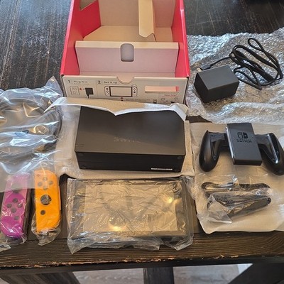 Nintendo Switch Console with Yellow & Purple Joy-Con, Wi-Fi, HDMI, USB-C