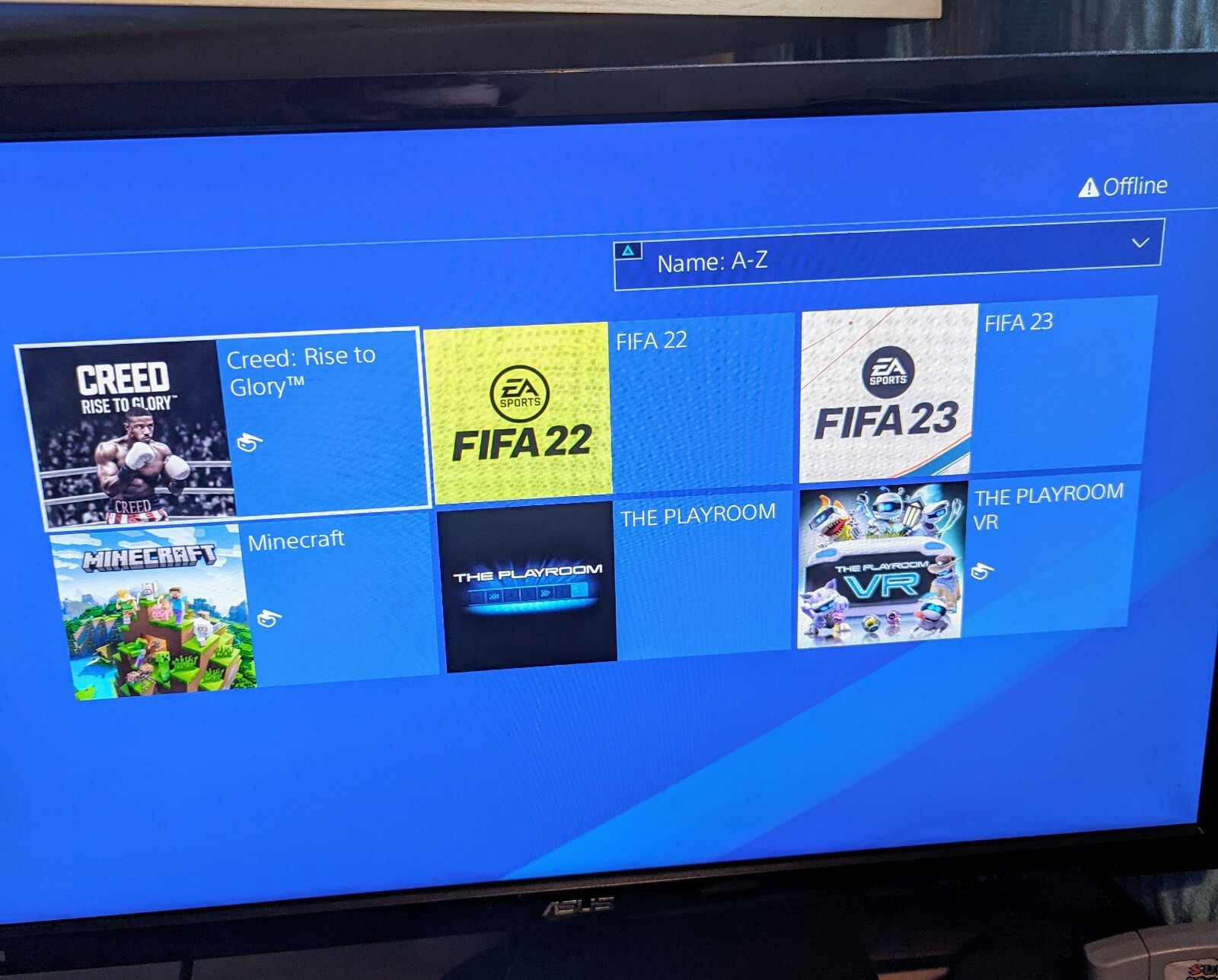 Sony PlayStation 4 Slim 500GB Console with Controller + Games (FIFA 23