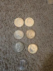 Lot Of 7 JFK half dollars (4) 1964, (2) 1968, and Silver Bicentennial. See Pics