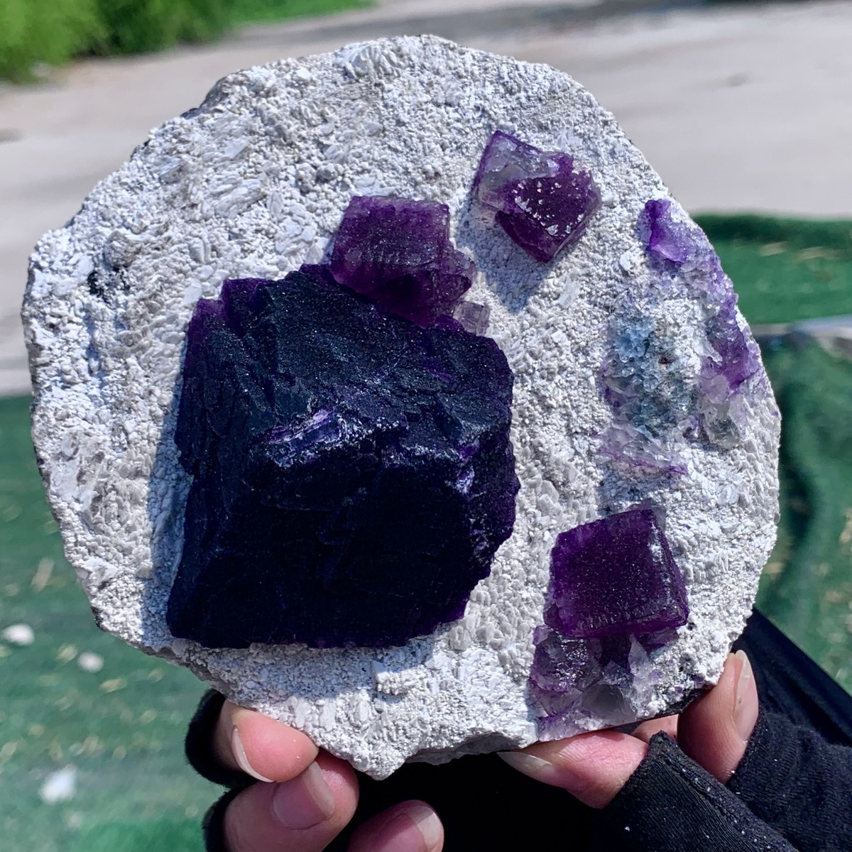 Natural purple cubic fluorite mineral crystal sample/China