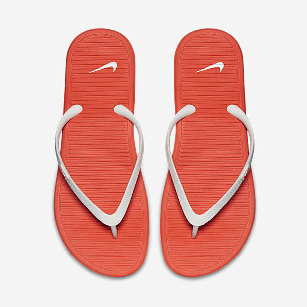 white nike solarsoft flip flops