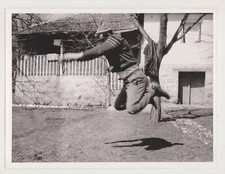 The Man in Mid-Air Gravity-Defying Moment Frozen in Time Unusual Abstract Photo