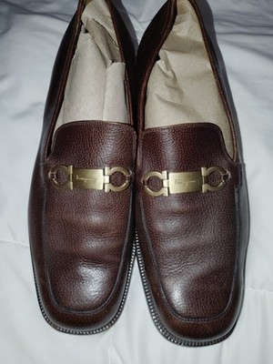 Salvatore Ferragamo men's brown leather loafers featuring the brand's signature