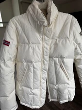 Excellent down jacket for a girl! Very high-quality stitching and classic cut! C