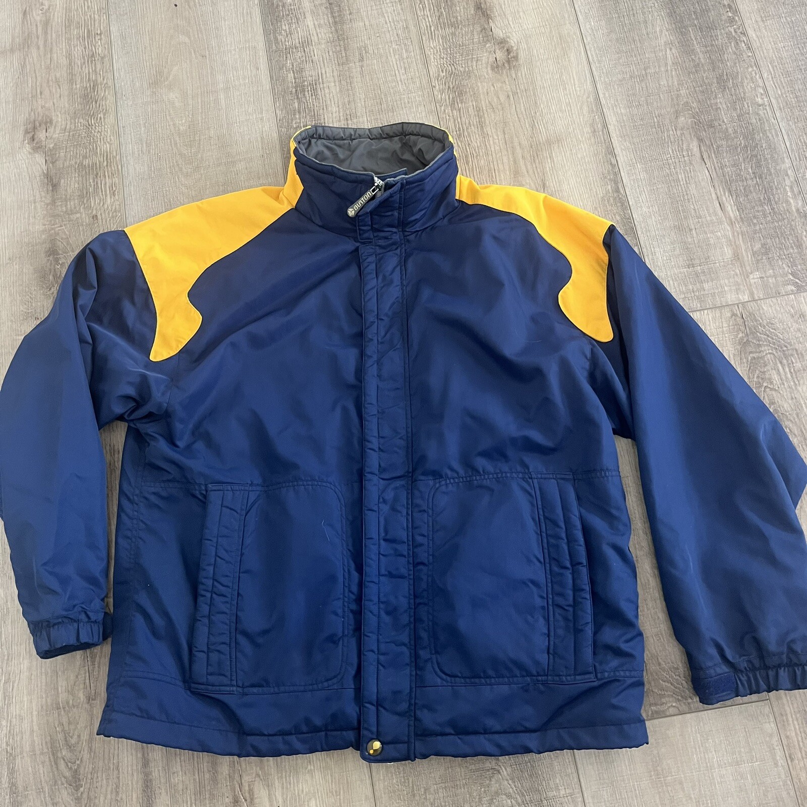 Chaqueta de esquí/snowboard Burton L BioLite STORM LITE con cremallera completa amarilla azul nueva sin etiquetas nailon