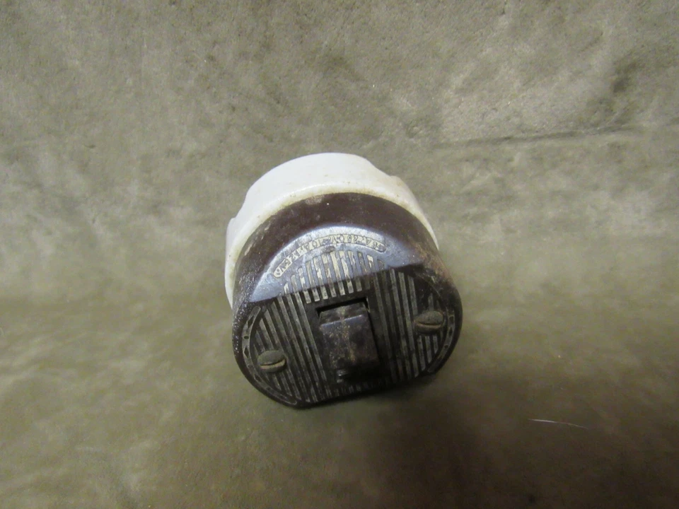 Interruptor de luz de plástico duro de baquelita marrón vintage con base de porcelana marca Leviton Foto 3 de 4