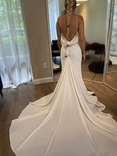 Wedding dress size 6 Brand New with tags. No Alterations!