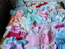 Large bundle of  mixed sizes  clothes for Baby Dolls . Pre-owned.mixed
