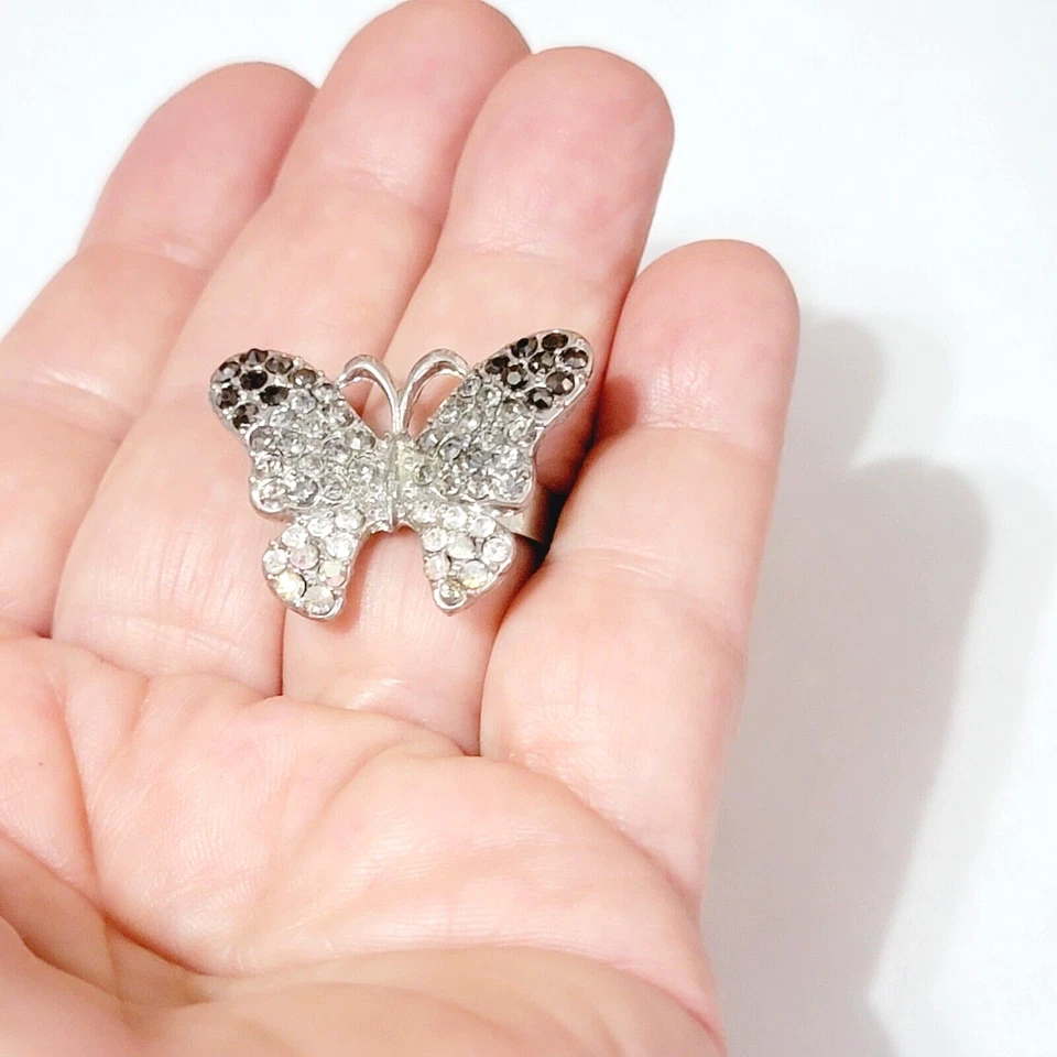 Anillo grande ajustable con diamantes de imitación mariposa tono plata vidrio negro gris r-13 Foto 2 de 4
