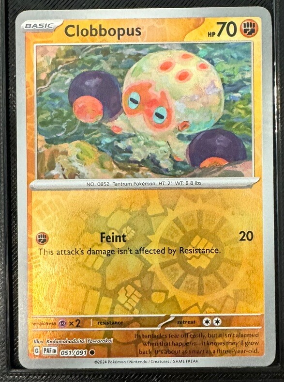 Clobbopus 051/091 Paldean Fates Common NM PAF EN Pokemon Card Scarlet & Violet