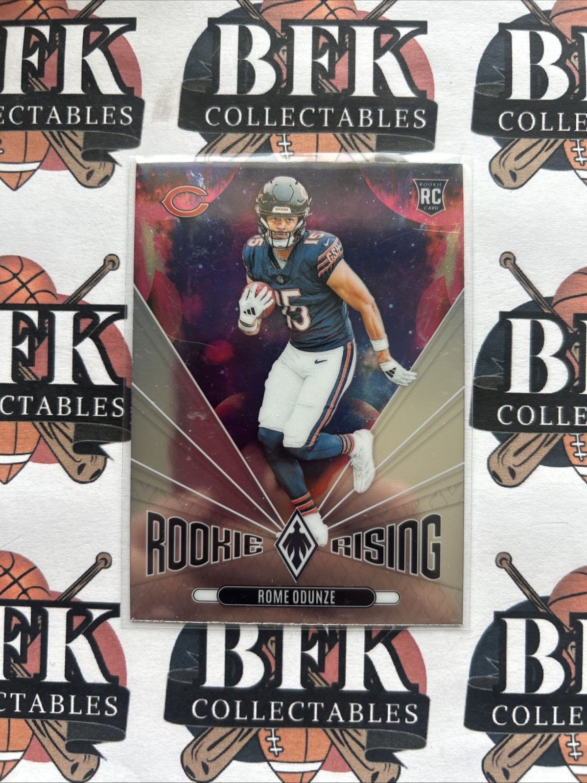 2024 Panini Phoenix - Rookie Rising Rome Odunze #RR-ROE Hyper (RC)
