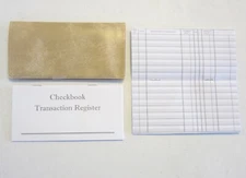 1 WHITE PARCHMENT VINYL CHECK BOOK COVER & 5 CHECKBOOK TRANSACTION REGISTERS 