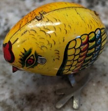 Alexander Taron ImporterAlexander Taron Importer MS006 Cute Yellow Tin Toy