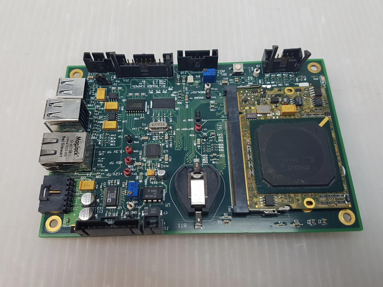 Kontron 800-689 board from an angle, showing USB, Ethernet jack and edge headers