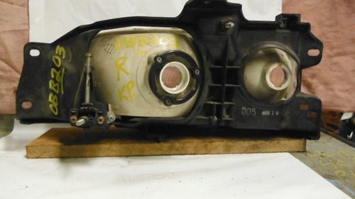 91 92 SCOUPE R. HEADLIGHT 24061