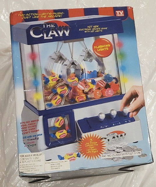 the claw toy grabber machine