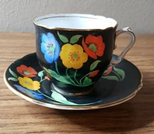 Bridgwood Hand Painted Floral With Black Background Cup and Saucer.