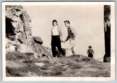 Vtg B&W Snapshot Young Couple Walking Near Stone Ruins Hillside Outside Mid