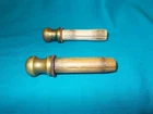 Two Civil War musket barrel plugs/tompions with brass tops and wooden base