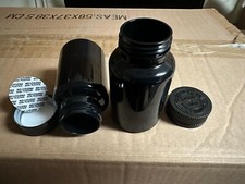 plastic Black bottles with CRC cap include pressure sensitive seal. 10,000
