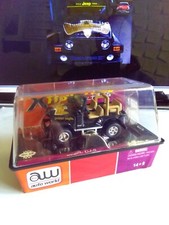 AUTO WORLD HO SLOT CAR JEEP CJ5 BLACK GOLDEN EAGLE XTRACTION ULTRA-G R6 34 2008
