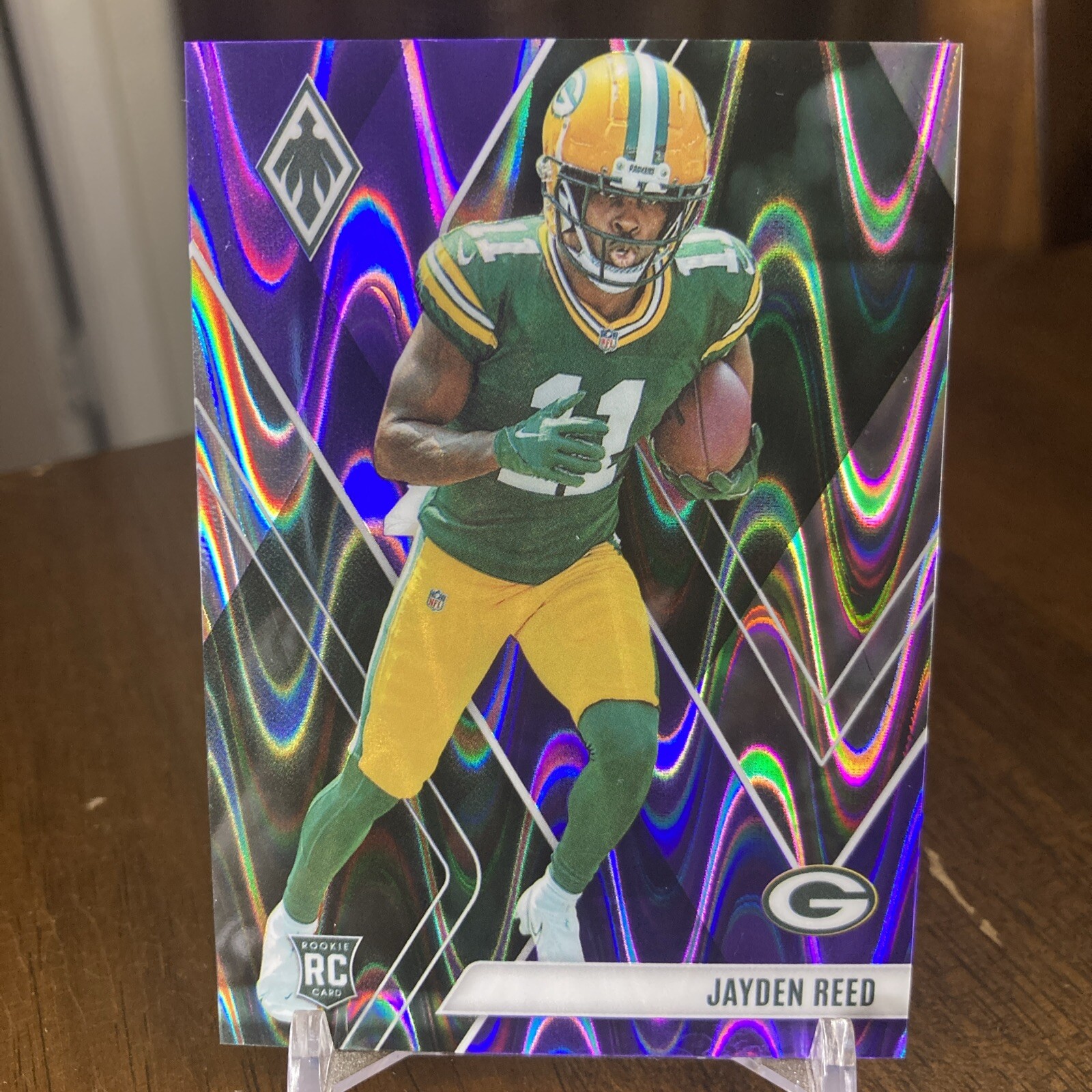 2023 Panini Phoenix Rookies Purple Seismic /125 Jayden Reed #111 Rookie RC