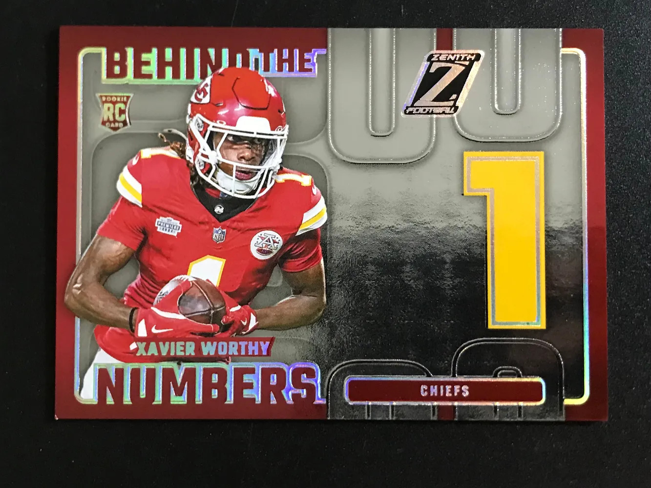 2024 Panini Spectra Football Behind the Numbers Xavier Worthy RC Holo #7 GL12