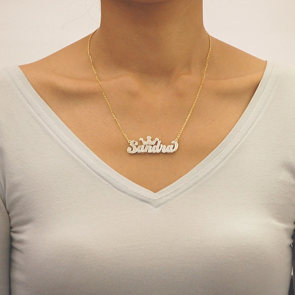 Name pendant deals with crown