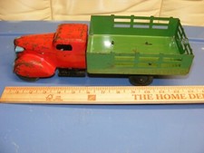 Vtg Wyandotte Long Nose Stake Truck Wooden Wheels paint chips bent axle nice