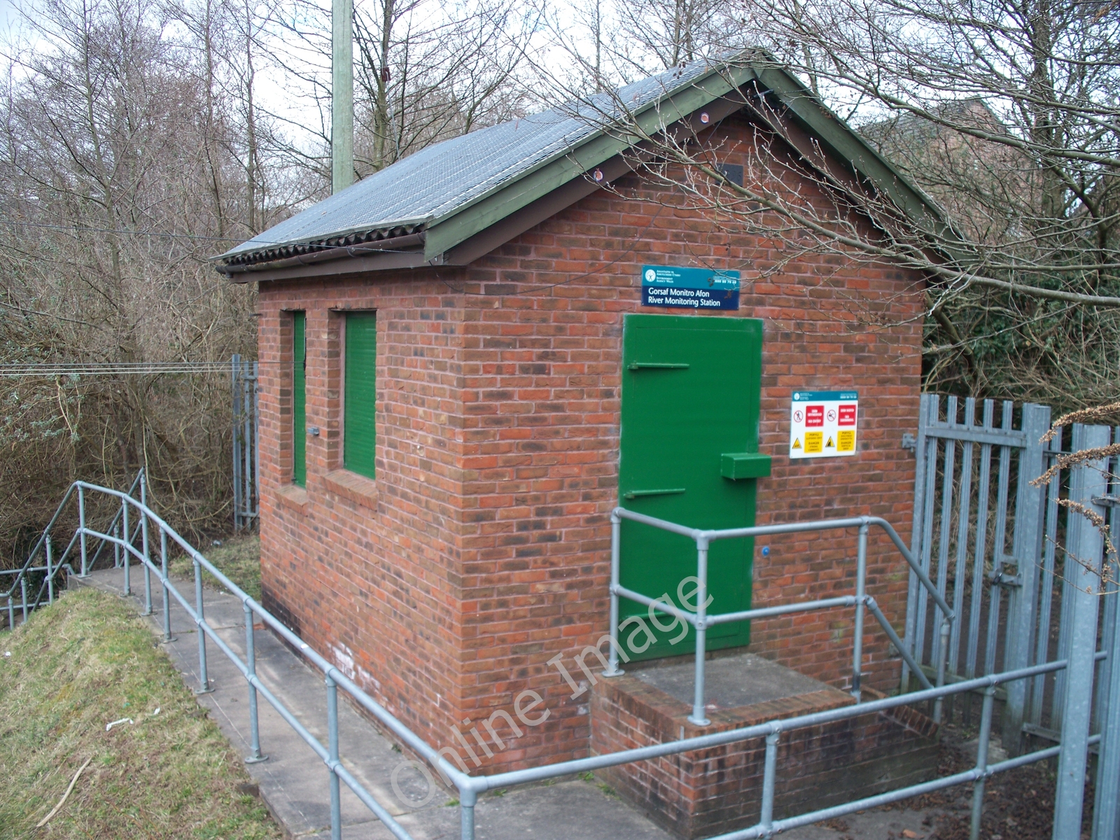 Photo 6x4 Alongside the river [3] Risca Seen from the footbridge is ...