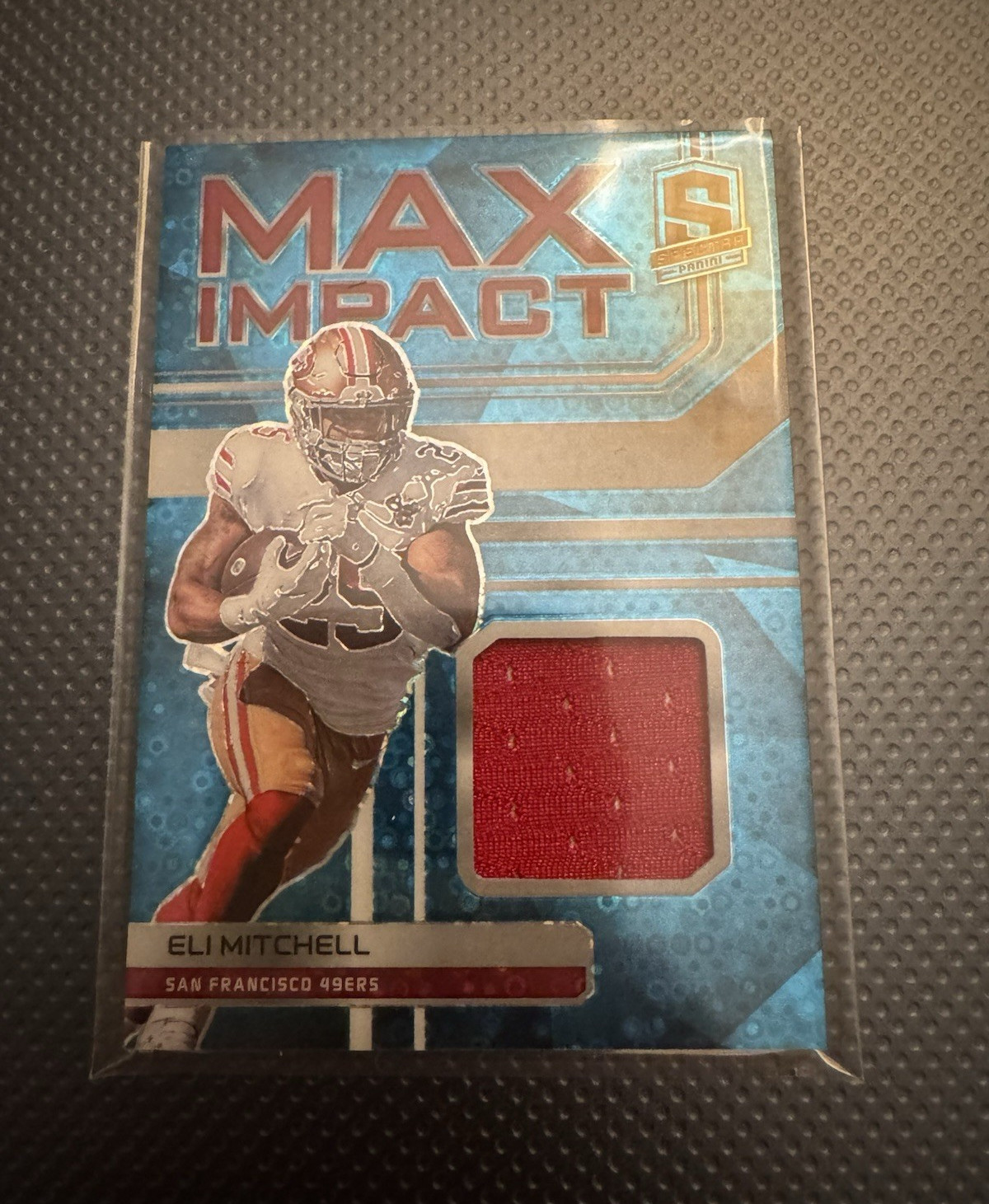 Panini 2022 Spectra Max Impact Eli Mitchell 49ers Neon Blue Prizm #MI-EMI /60