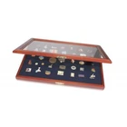 Wooden display case for presenting pins and badges.