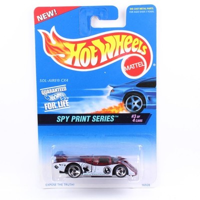 Hot Wheels 1997 - BLUE CARD COLLECTOR - SOL-AIRE CX4 - SPY PRINT SERIE